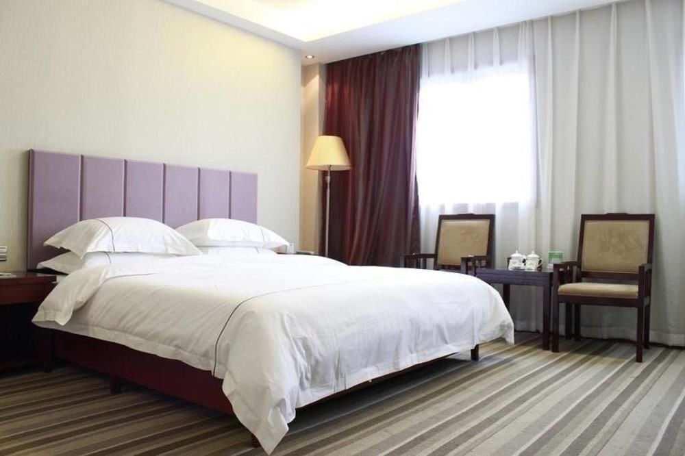 Jishou Heyi Hotel Fenghuang Bagian luar foto